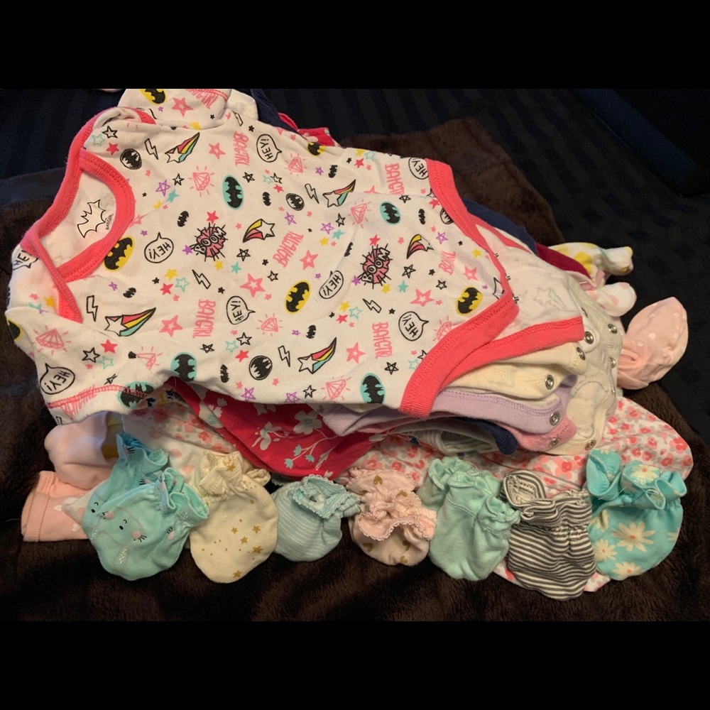 35 baby onesies/8 pair of hand guards. NB-3 month